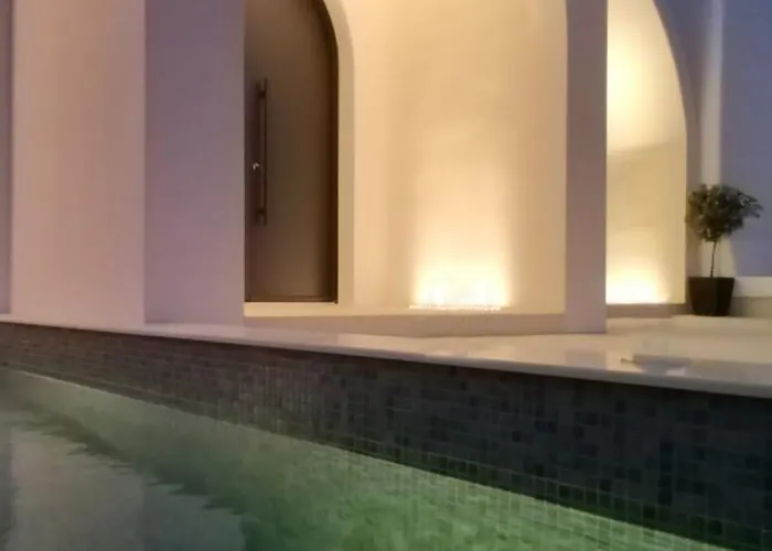 Artium With Outdoor Pool Hosted By K&k